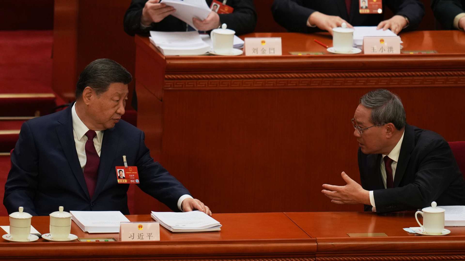 China lowers growth target below five percent